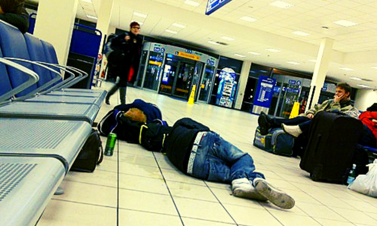 750x450 sleeping in airport